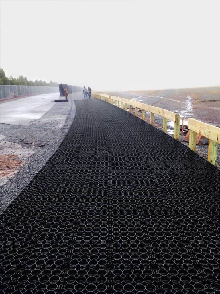 installlation process of pervious pavement, permeable pavement installation process, permeable parking lot, unfilled permeable plastic grid, unfilled truegrid permeable pavement, unfilled truegrid permeable pavement installation,