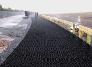 installlation process of pervious pavement, permeable pavement installation process, permeable parking lot, unfilled permeable plastic grid, unfilled truegrid permeable pavement, unfilled truegrid permeable pavement installation,