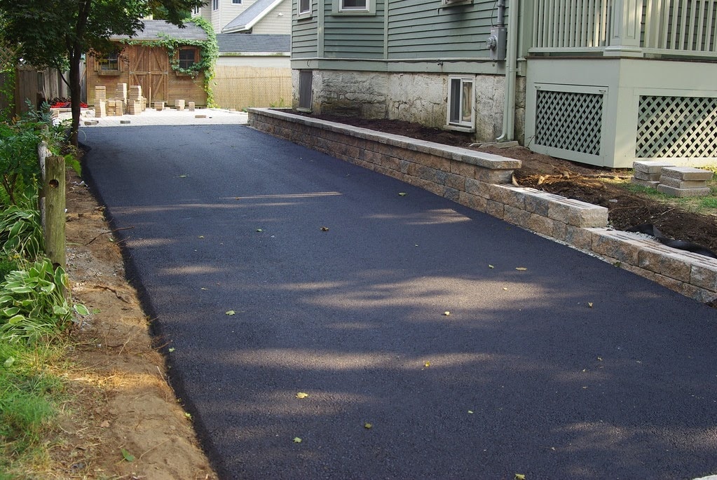 Blacktop vs Concrete Driveway