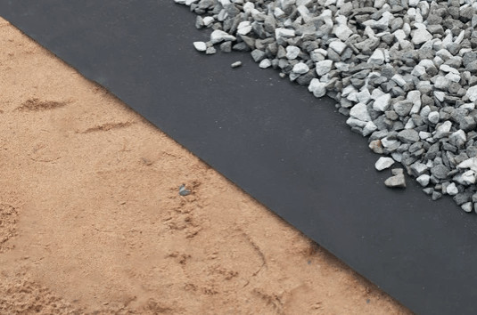 Installing Filter Fabric for Gravel Driveways