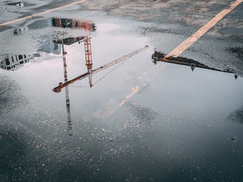 What Causes Puddles to Form in Parking Lots?
