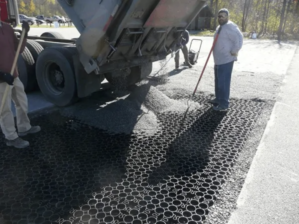 Man working on permeable paving installation