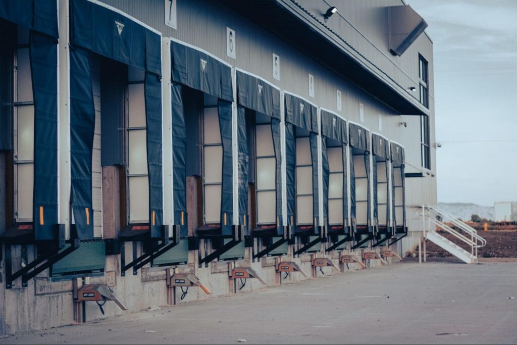 a row of parking spots showing a parking ratio for an industrial building.