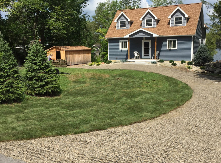 Installing gravel permeable paver driveway 