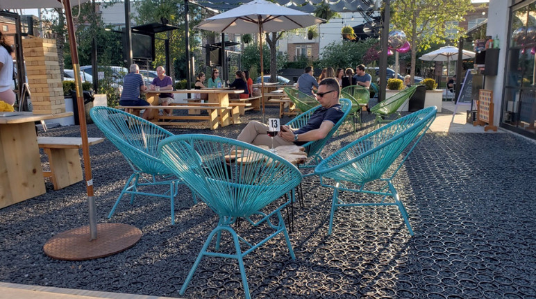 A patio area with gravel filled permeable grid paver.