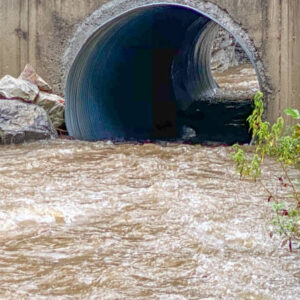 An image of stormwater wash off through a culvert.