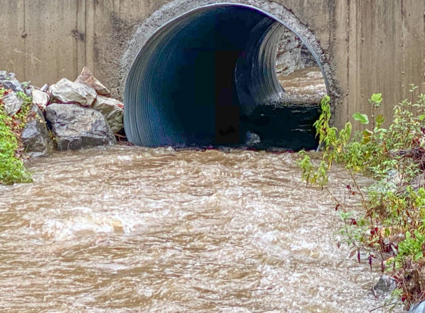An image of stormwater wash off through a culvert.