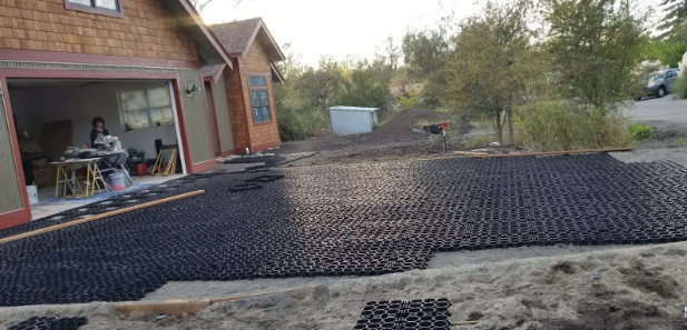 Installation of a driveway drainage solution for a homeowner.