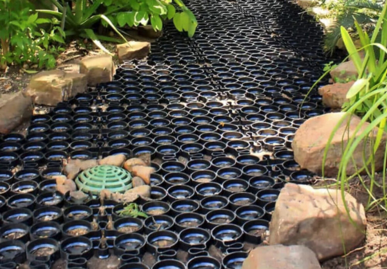 A garden walkway made with grid pavers designed for drainage. 