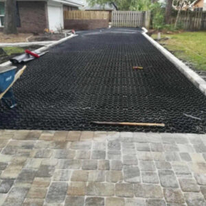 TrueGrid paver system installed in a residential driveway.