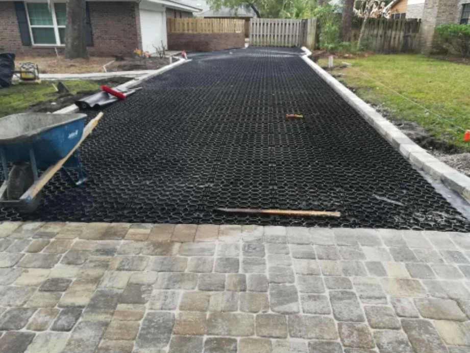 TrueGrid paver system installed in a residential driveway.