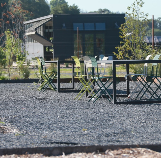 Outdoor seating area with TrueGrid permeable pavers filled with gravel