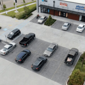 An image of a commercial parking lot with a permeable paving system. 