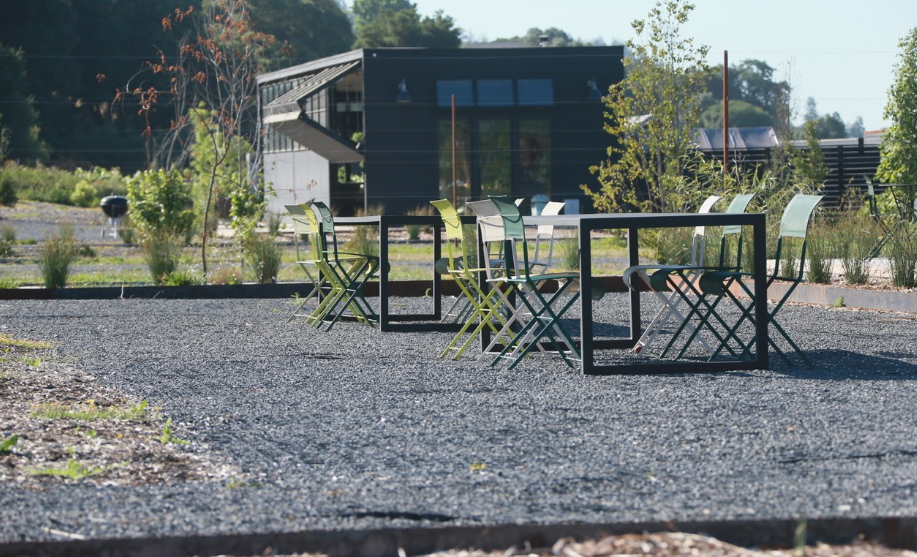 A modern patio with TRUEGRID permeable pavers to reinforce and protect stone.